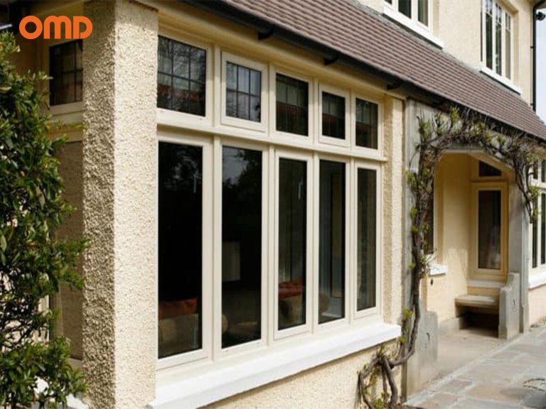 Cream white aluminum window with a sleek, modern design, featuring a smooth finish and clean lines. The window frame complements a variety of architectural styles, offering both durability and aesthetic appeal.